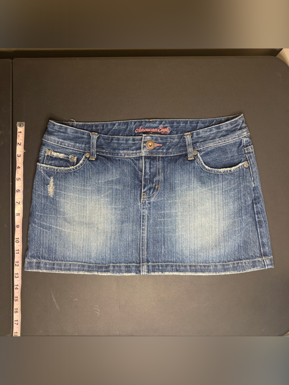 American Eagle Blue Jean Denim Mini Skirt with pink embellished pockets